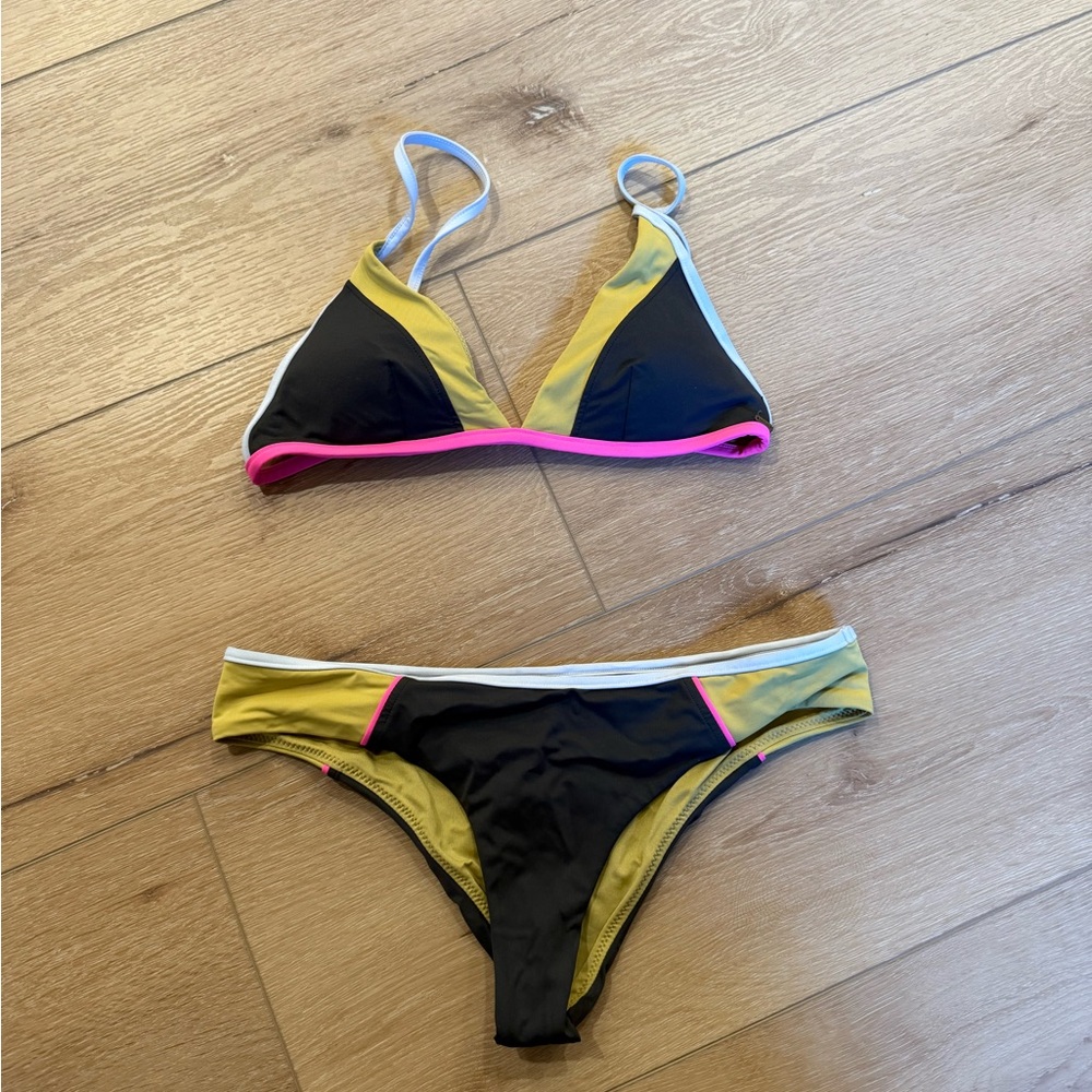 Rip Curl Black and Gold Bikini Sleek Modern Design
